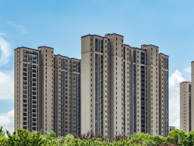 杨伟民:楼市限购政策可以继续放宽,房地产市场放宽限购会如何?